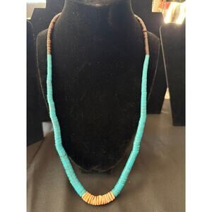 Southwestern style necklace with turquoise howelite and coral heishi beads
